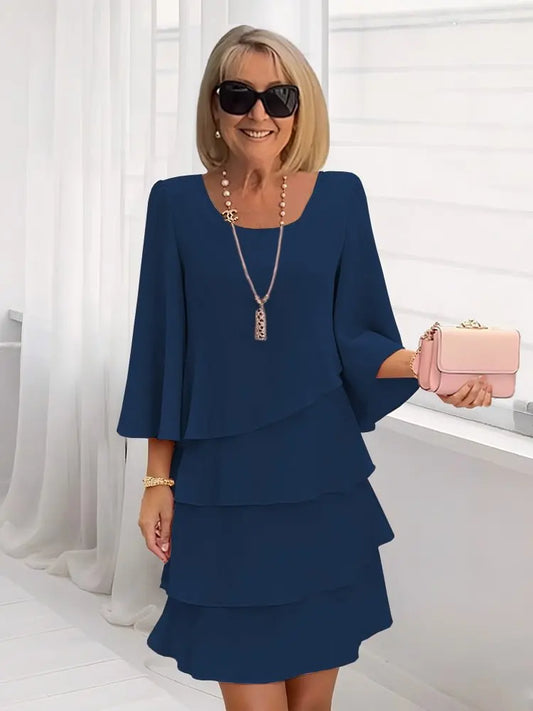 Carmen – Elegante vestido fluido con volantes