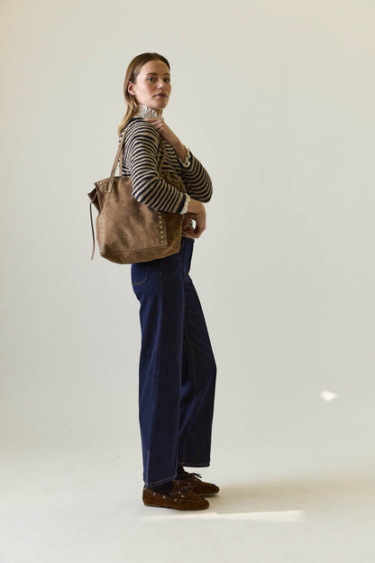 Bolso tachas lazo topo