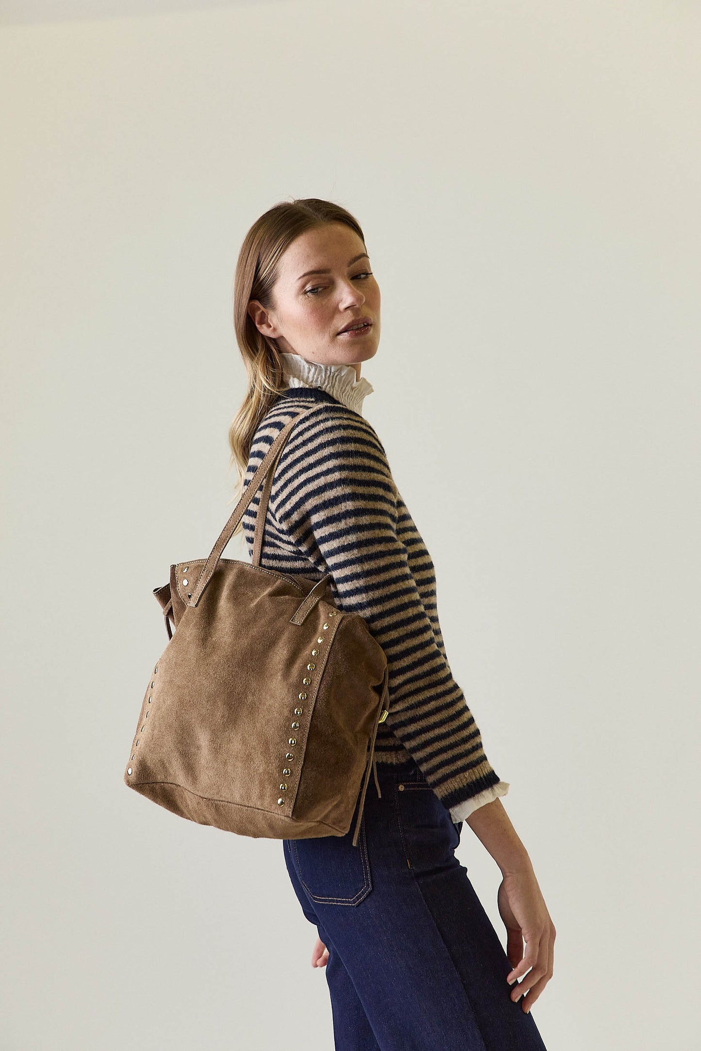 Bolso tachas lazo topo