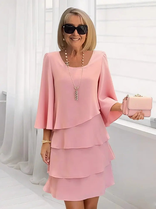 Carmen – Elegante vestido fluido con volantes