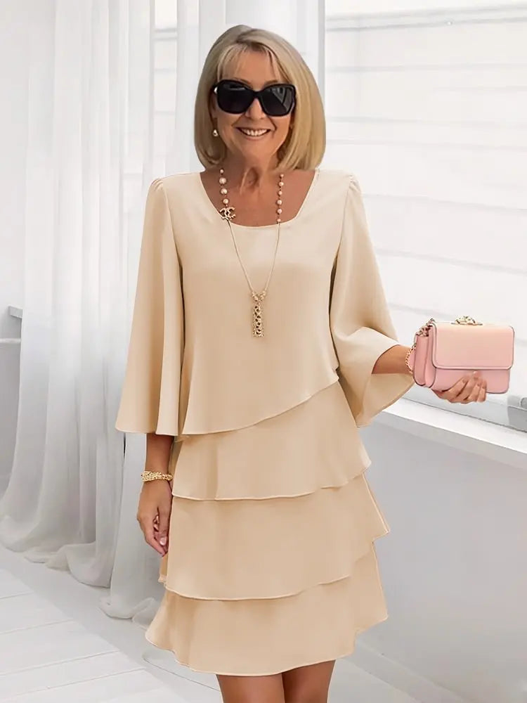 Carmen – Elegante vestido fluido con volantes
